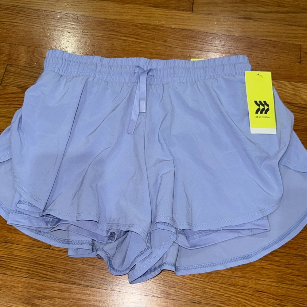 Girls all in motion 2 in 1 shorts size L 10/12. NWT